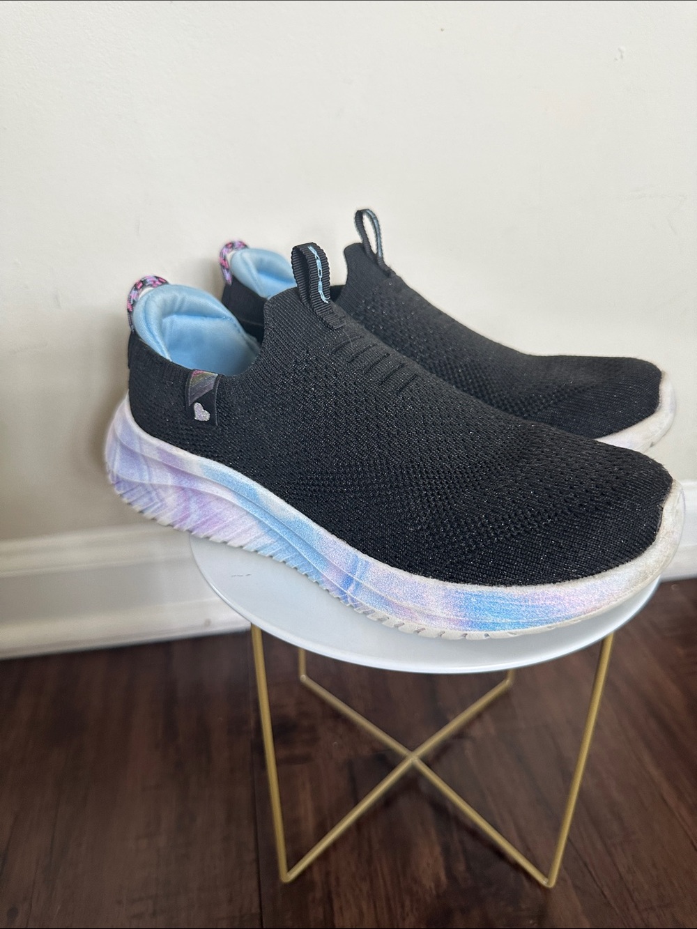 Skechers Kids Black Slip-On Sneakers with Pastel Rainbow Midsole